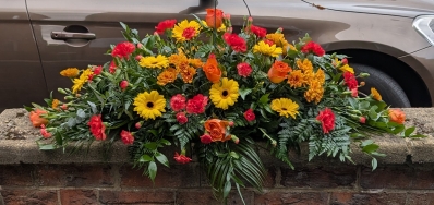 Mixed orange and yellow top spray